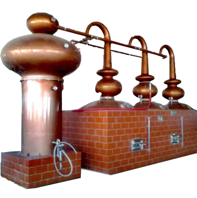 three huge pot stills sitting in blocks construction heat isolation, red copper onion heads, swan necks and pipelines, one heat exchanger aside