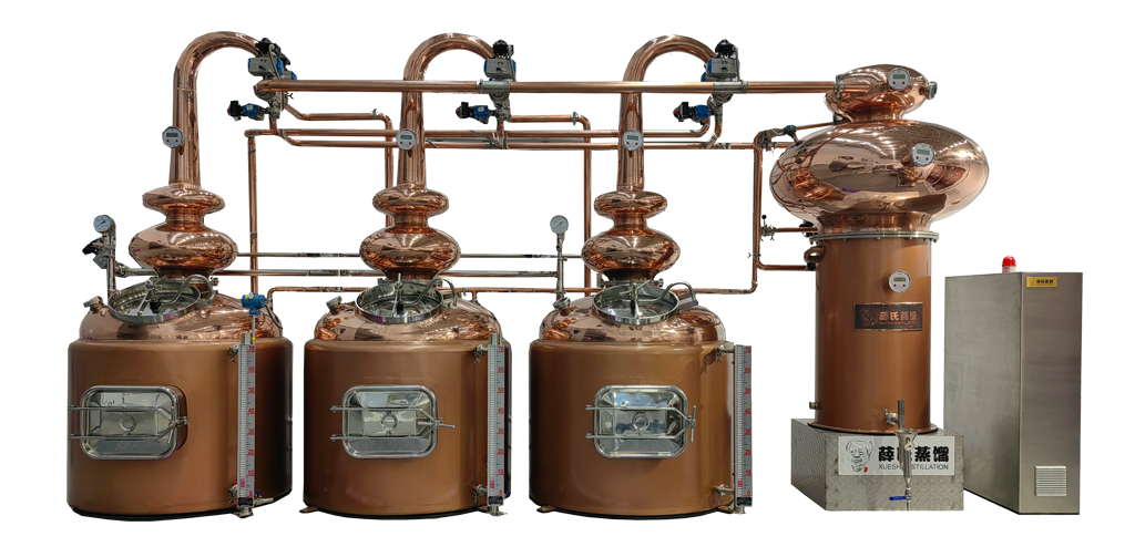 Three pot stills each volume 3000L and a huge heat exchanger, all system made in red copper