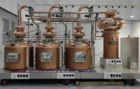 A continuous multi pot still distiller composed of three pot stills, one heat exchanger and pipelines