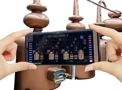 a smart phone held by hands displays the flow diagram of the distillation process